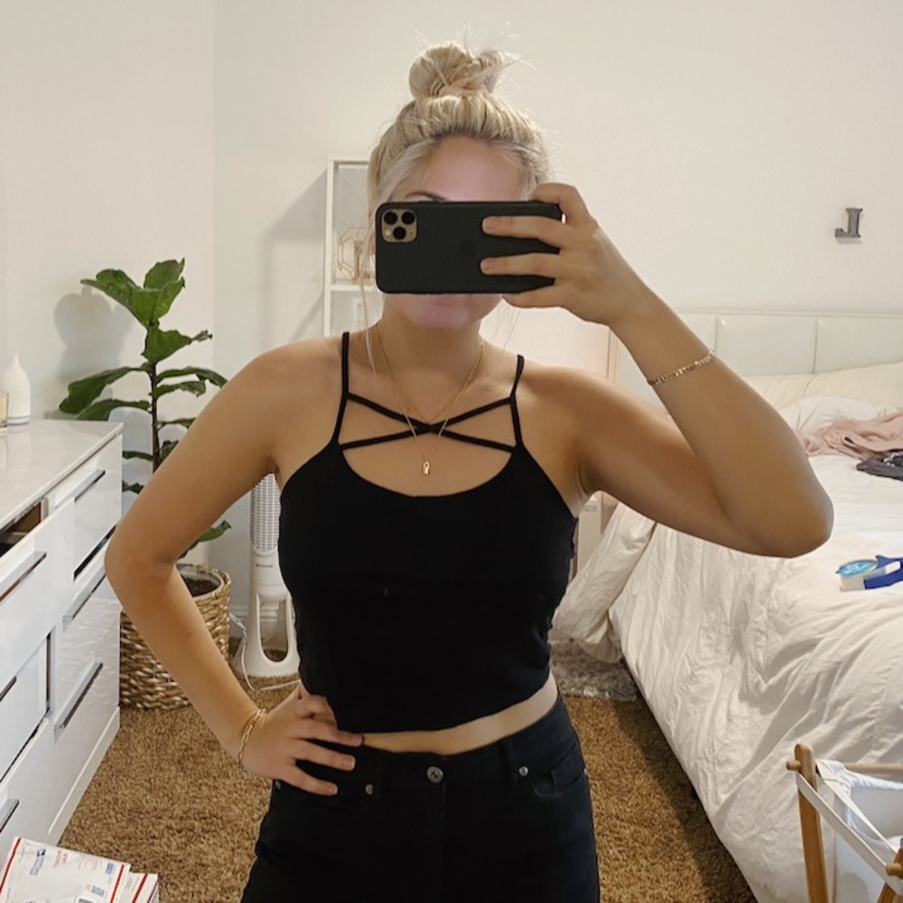 Stretchy black tank top with cross cross detailing